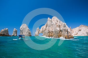 Wavy water in front of Arches of Cabo San Lucas