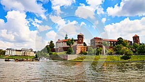 Wawel castle - famous landmark in Krakow Poland. Picturesque landscape on coast Vistula river during the sunny day