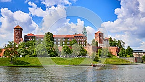 Wawel castle - famous landmark in Krakow Poland. Picturesque landscape on coast Vistula river during the sunny day