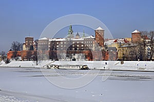 Wawel Castle in Krakow and frozen Vistula river photo