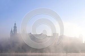 Wawel Castle in Krakow in morning fog