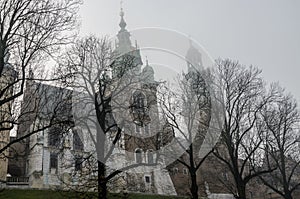 Wawel Castle in the morning fog in Krakow, Poland