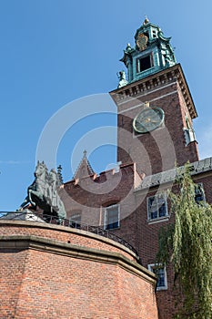 Wawel Royal Castle in Krakow Poland, with Tadeusz KoÅ›ciuszko Monument in front