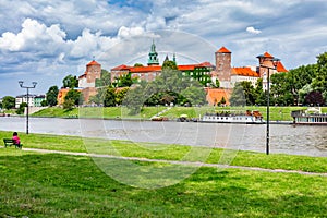 Wawel Royal Castle and Vistula river in Cracow, Poland as seen from Vistulan Boulevards