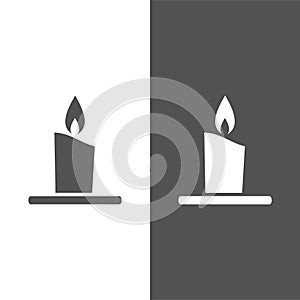 Wax candle icon on white and black background