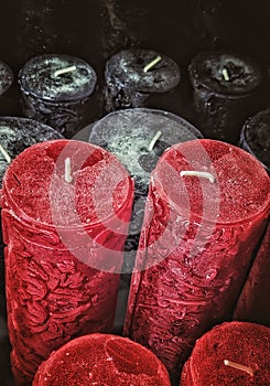 Wax candles of red and black color