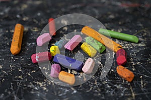 Wax crayons on black background