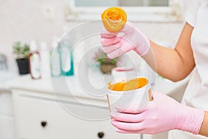 wax for depilating talcum and fabric strips lying on the table has a place for writing