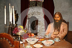 A wax figure of aged man Grigory Rasputin. The murder of Rasputin at the Yusupov Palace - reconstruction of the wax figures.