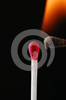 Wax match on fire