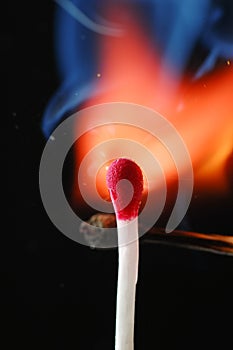 Wax match on fire