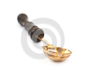 Wax melting spoon laddle isolated