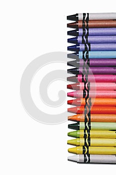 Wax multi-colored crayons isolated on white background