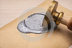 Wax stamp to create a three-dimensional impression.