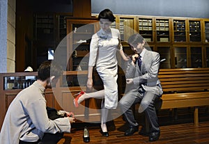 wax statue in shoe store, Chinese Style,shopping in shoe store