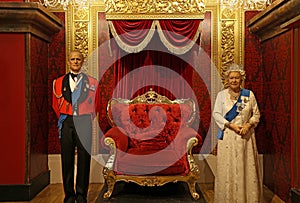 Prince philip and queen elizabeth II wax statues at madame tussauds in hong kong