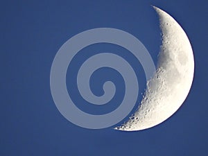 Waxing crescent moon phase before sunset
