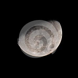 A Waxing Gibbous Moon against Black Sky