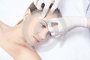 Waxing woman body. Sugar hair removal. laser service epilation. Salon wax beautician procedure