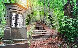 Way of the Cross, path with stairs and Christian sculptures through the forest in Malmedy, Belgium.