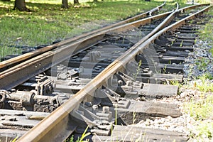 The way forward railway. Two railway tracks merge. Close-up shots of the tracks