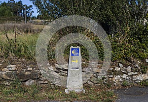 Way marker sign, that guides the pilgrims along the Camino de Santiago in Galicia, Spain.