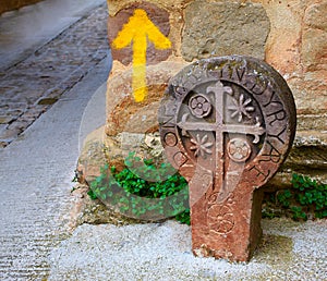 The way of Saint james yellow arrow sign Pamplona
