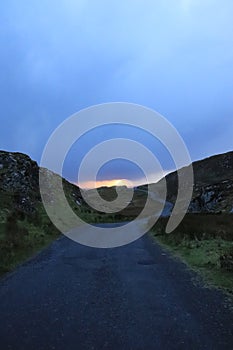 Way to Slieve League on cloudy evening - dark rainy clouds - Northern Ireland travel - Atlantic ocean - Irish tours