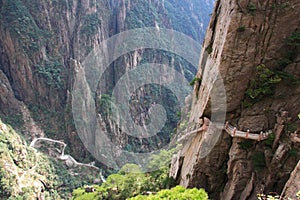 Stone Steep Steps . Trekking walking hiking Huangshan Mountain.