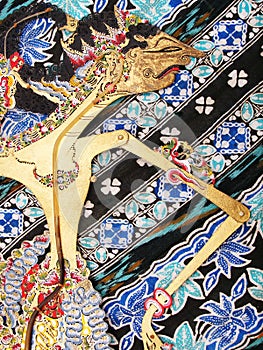 Wayang Kulit puppet on batik