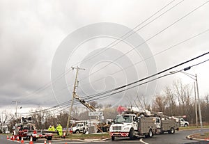 Wayne, New Jersey, USA 03/31/2019: Public Service employees fix broken telephone pole background image