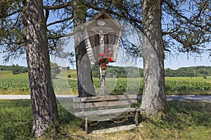 Wayside shrine and bench