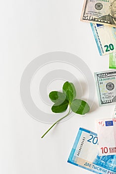 Wealth, success, business, lucky investment, win, jackpot concept. Lucky talisman. Saint patrick`s day. Money and shamrock. Four