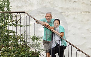 Wealthy Asian elderly couple vacation in summer luxury vacation