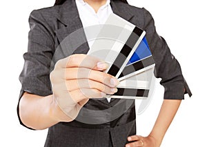 Wealthy businessman holding many credit cards