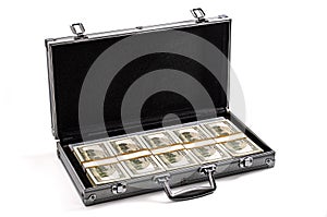 Wealthy investor, offering a bribe and greed conceptual idea with shiny silver open briefcase full with 100 dollar bills isolated