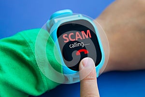 Wearable kids smart watch receive unwanted scam call and track location with touch screen and voice service and boys hand try to