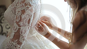 Wearing belt on wedding dress closeup