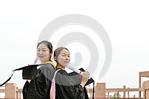 Wearing a doctoral graduation clothing students