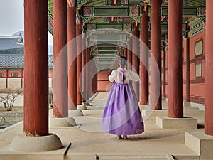 Wearing Hanbok traditional Korean clothes in Gyeongbokgung Palace in Seoul, Korea