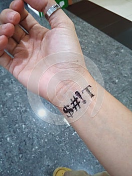 Wearing temporary tattoo