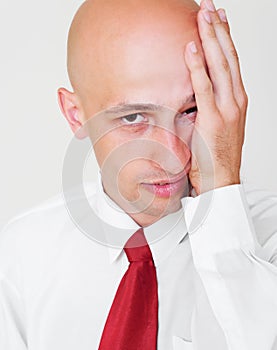 Weary businessman over grey background