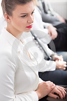 Weary lady waiting for exam