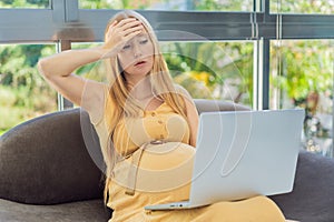 Weary pregnant woman, tired of working from home, navigates the challenges of balancing professional tasks with