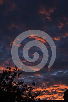 Weather background: Gathering cumulus clouds at sunset. Dramatic cloudy background. 1