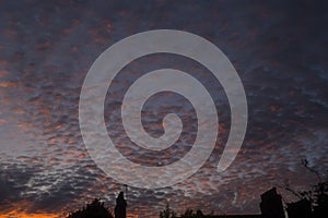 Weather background: Gathering cumulus clouds at sunset. Dramatic cloudy background. 10