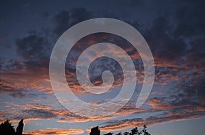 Weather background: Gathering cumulus clouds at sunset. Dramatic cloudy background. 4