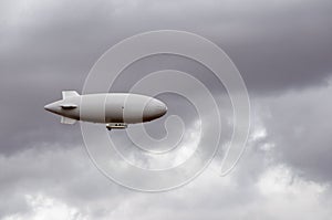 Weather blimp in the sky photo