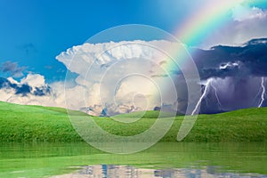 Weather forecast concept with colorful rainbow and lightnings photo