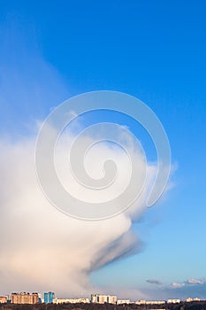 Weather front over town in spring